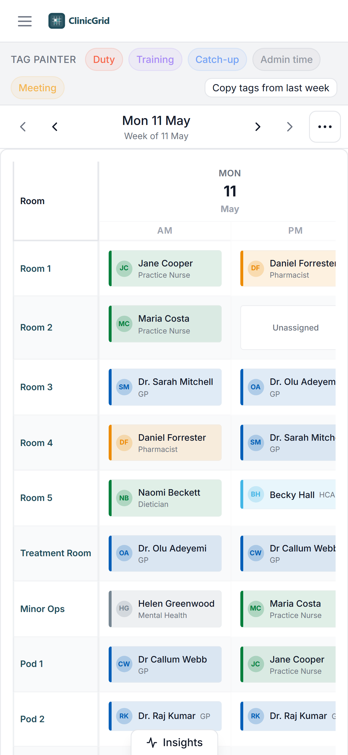 ClinicGrid mobile day view showing rooms down the left with clinicians assigned to AM and PM sessions